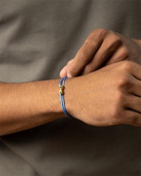 Preview: 1,5 mm hellblaues Nylonarmband mit einem Titan-Unendlichkeitszeichen - Infinity Light Blue Gold